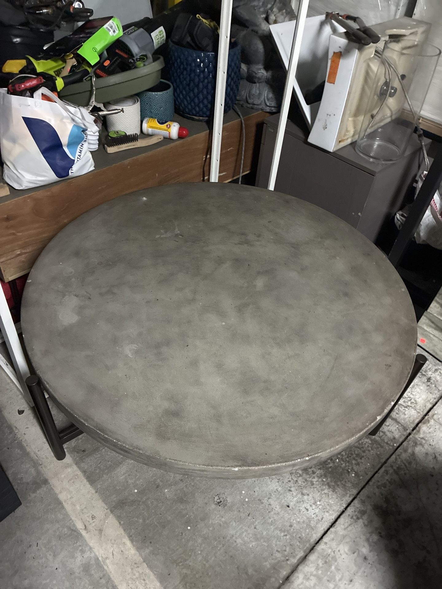 Round Concrete Coffee Table with Metal Legs – $150