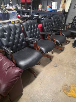 4 black office chairs with tufted backrests, $100 for the set of 4