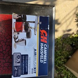 Spray Gun and Lots Of Paint 