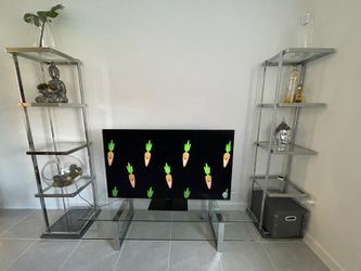 Beautiful Chrome And Glass TV Entertainment And Shelves