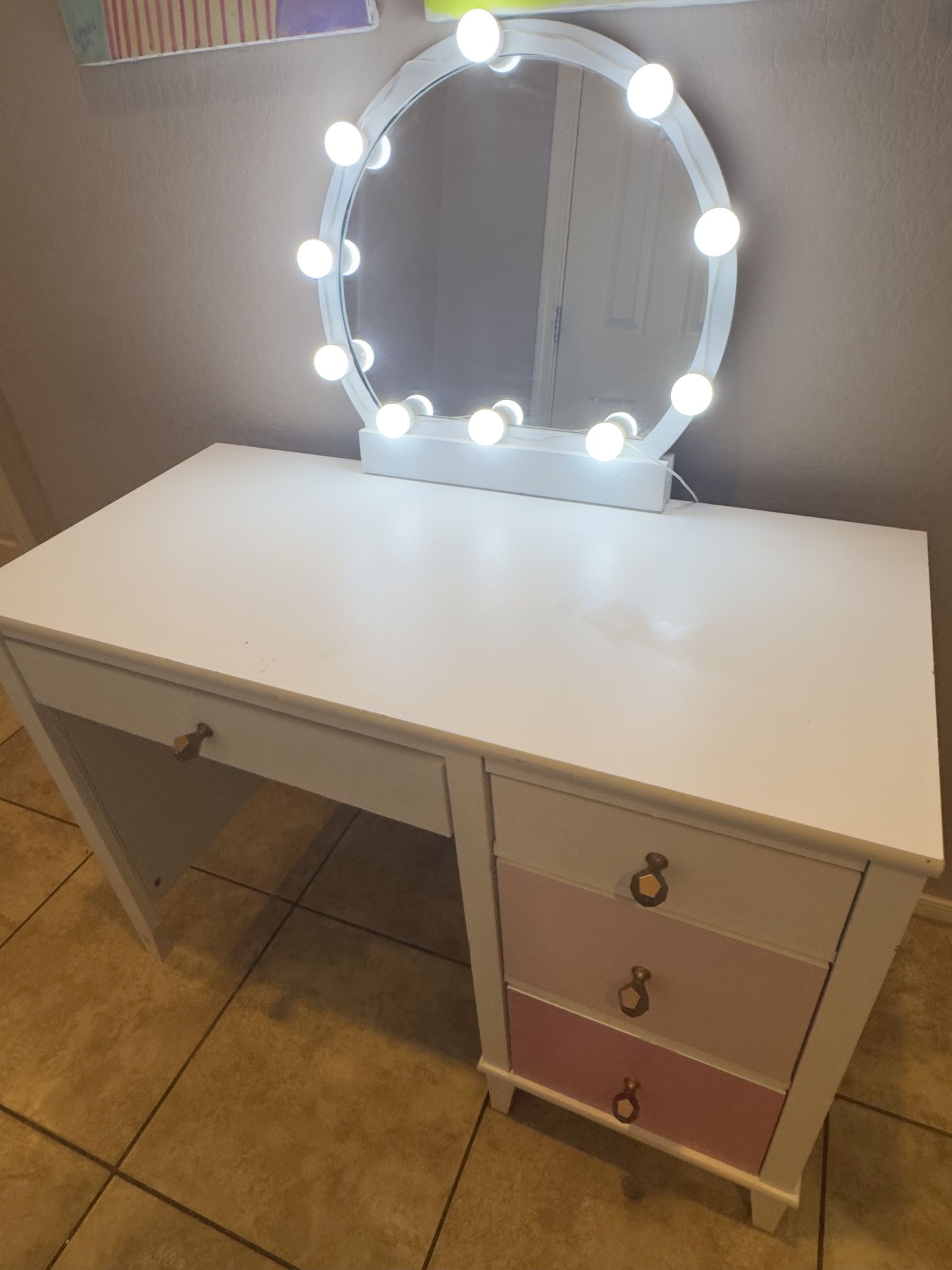 Vanity With Adjustable Lighting And Mirror
