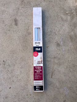 white Bali Cordless 1" Vinyl Horizontal Blind measuring 34 x 64 inches (actual width: 33 1/2 inches)