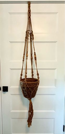 Large 5 foot 3” ( 63”) vintage boho macrame jute plant hanger w/ wood beads.