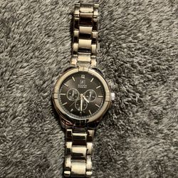 George Diamond watch with metal band and black dial