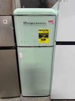 Brand new Frigidaire 7.5 cu. ft. Mini Refrigerator with Rounded Corners and Top Freezer in Mint Green
