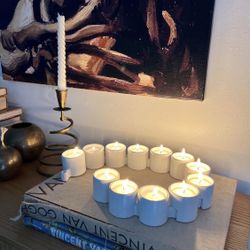 The IKEA Varmeljushallare is a set of 12 vintage interlocking white ceramic tea light candle holders designed by Ehlen Johansson in the 1990s.  Connec