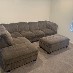 Gray Sectional with Storage Ottoman 