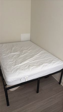Full sized mattress with topper and bed frame