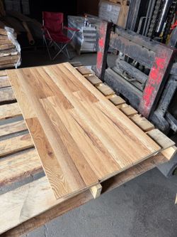 $0.70/sqft - Light Oak Laminate Flooring