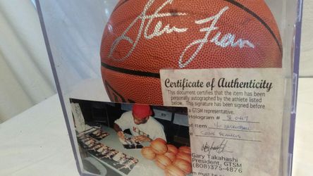 Basketball signed by one time Houston Rockets star Steve Francis with photo and Certificate of Authenticity.