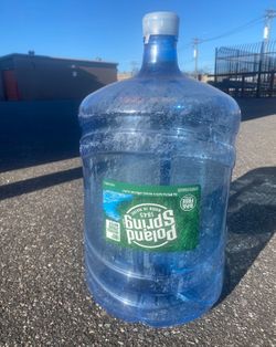 8 Empty, clean, Poland springs water bottles 