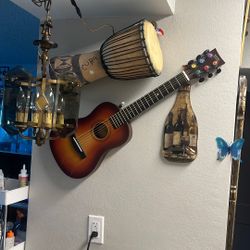 Todo Guitara Tambor. Lámpara. $100