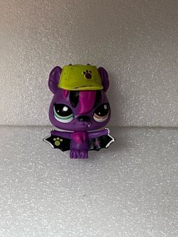 LPS Bat #2719 is purple with a black and pink hair tuft