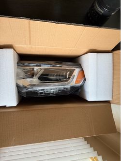 Head light for a Chevy Traverse