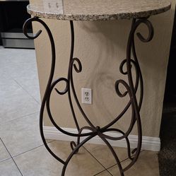 Round granite top pub table wrought iron base