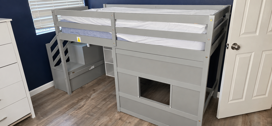 Grey twin loft bed with play area