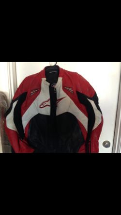Two riding jackets and boots