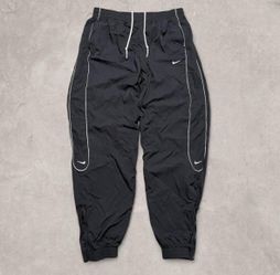 Nike solo swoosh track pants