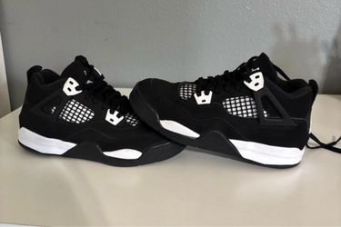 Air Jordan 4 Black and White Sneakers