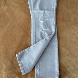Light purple (lilac) color distressed jeans. No signs of damage and only worn once. Lightweight and stretchy.