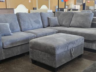 Gray Corduroy Sectional with storage ottoman