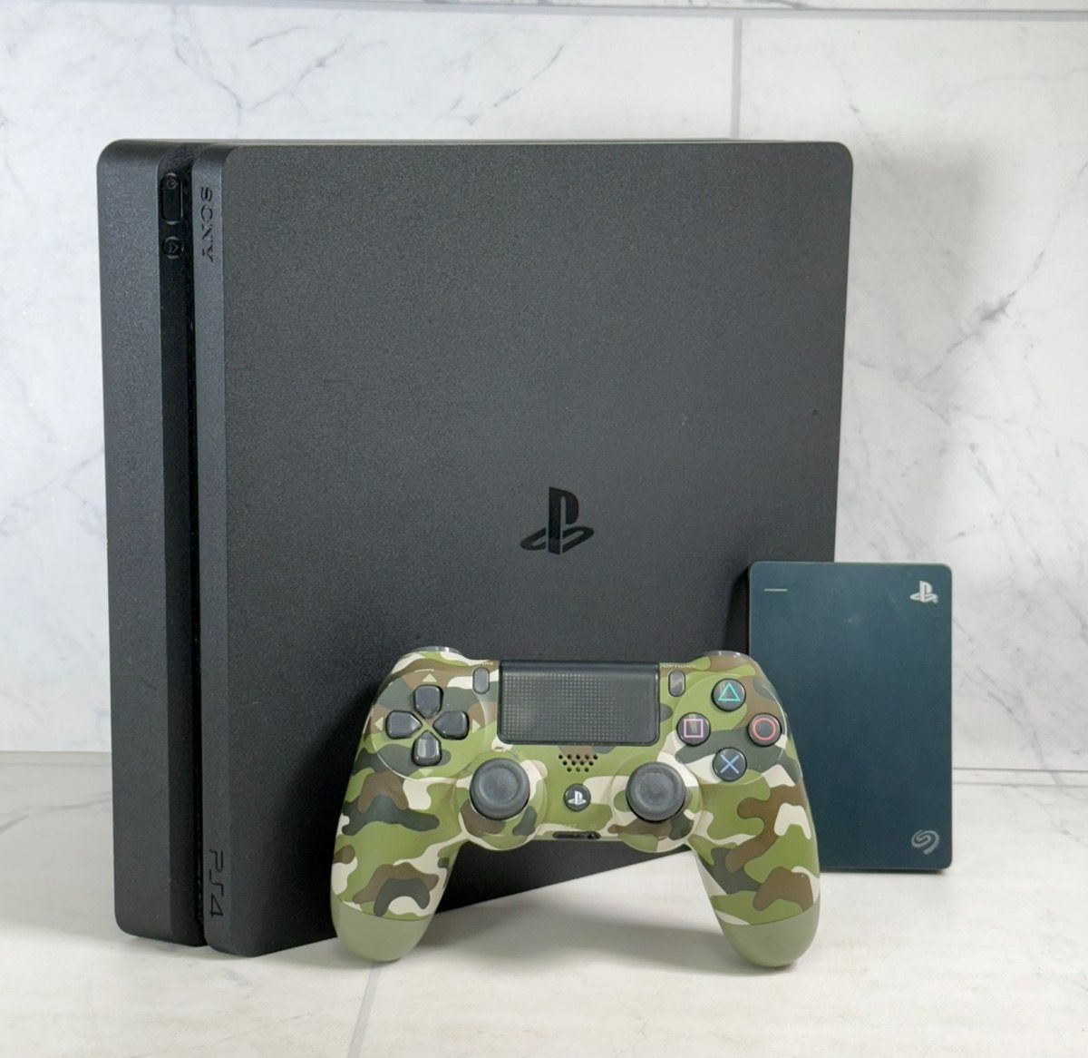 Sony PlayStation 4 Slim 500GB Console + 2TB External Drive β PS4 β Jet Black (A1G009304)