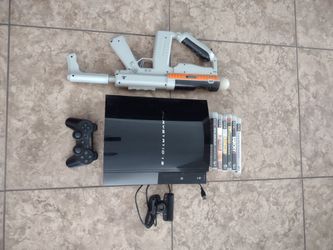 PlayStation 3 console w/ games