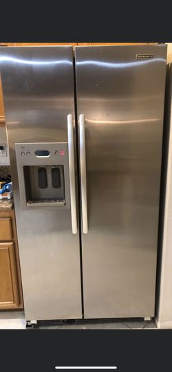 Beautiful side by side refrigerator in good condition and ready to get picked up! Water dispenser works but ice dispenser needs minor repair.