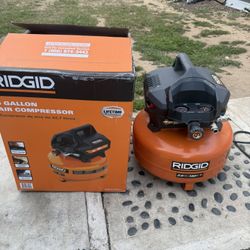 RIDGID 6 Gal. 150 PSI Portable Electric Oil-Free Jobsite Pancake Air Compressor with Dual Pressure Gauges and 2-Quick Couplers