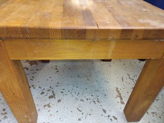Two wooden side tables