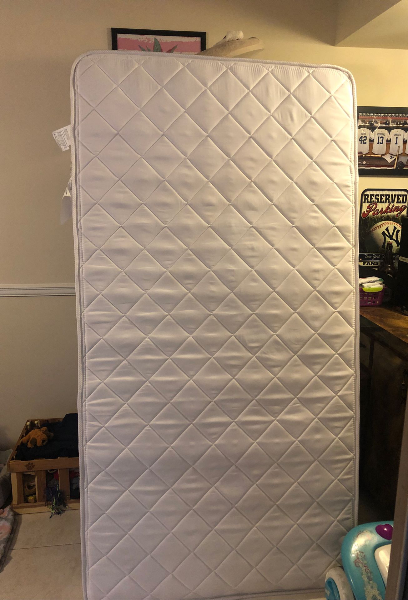 Twin mattress with protector