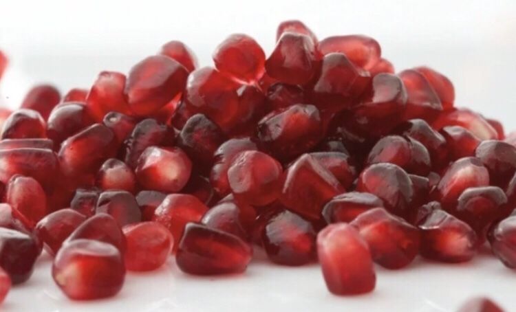 Fresh pomegranate sweet seeds.