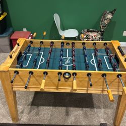 Fat Cat foosball table