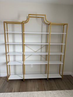Large gold and white shelf
