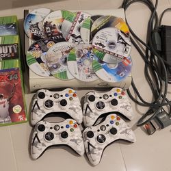 XBox 360, 4 Wireless Controllers & 13 Games.