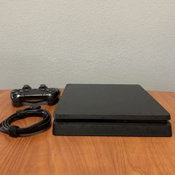 1 TB PS4 AND GAMES