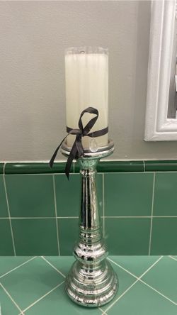 Candle holder with candle