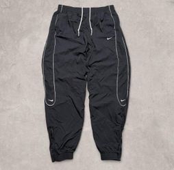 Nike solo swoosh track pants