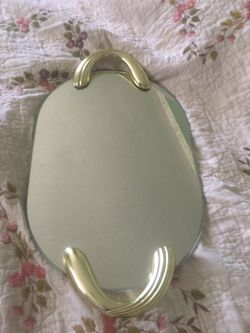 Mirror to put your perfume or glass bottles on