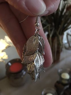 Silver leaf light dangling earrings