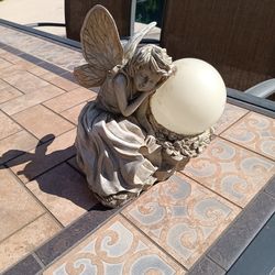 $12 Sleeping Angel Garden Decor. The solar doesn't work, But Still nice Garden Decor