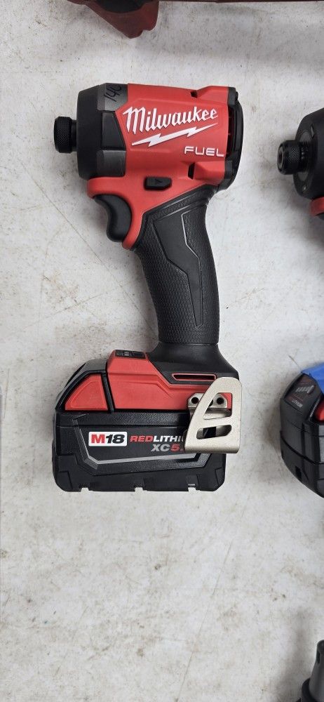 NEW MILWAUKEE FUEL M18 IMPACT DRIVER WITH 5AH BATTERY 140$ PRICE FIRM