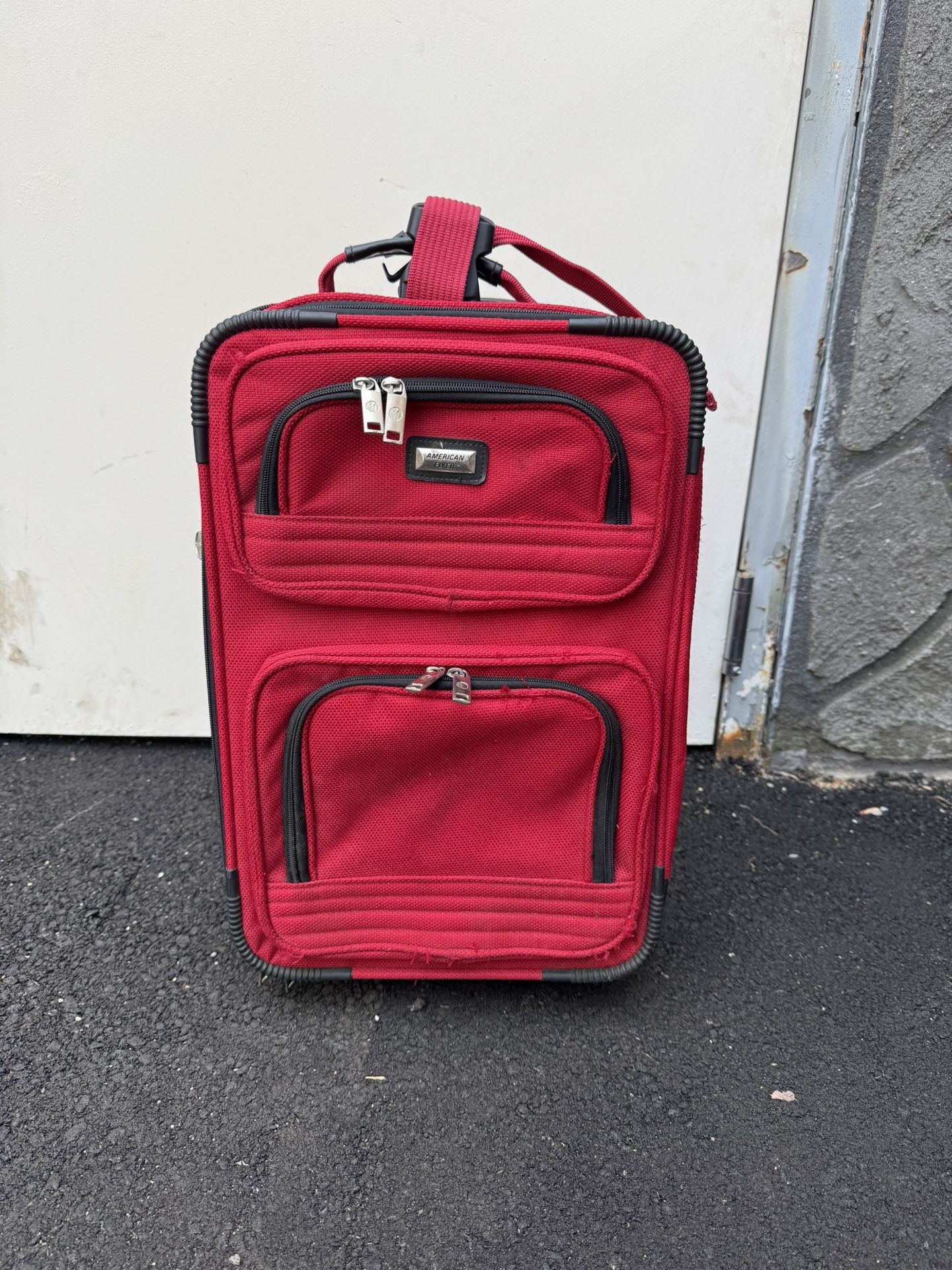 Red Carry-on Rolling Suitcase