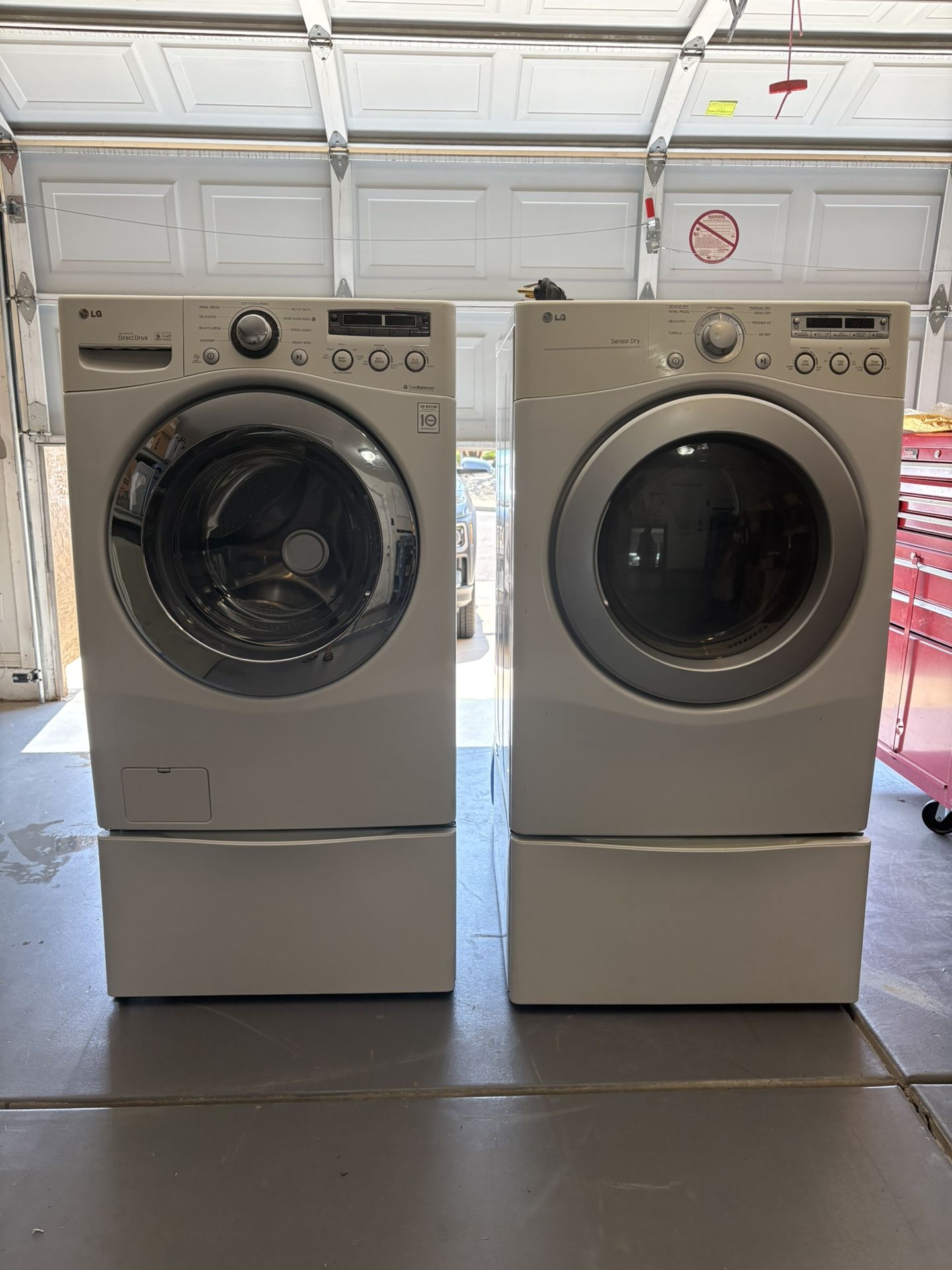 LG Front Load Washing Machine And Dryer With Pedestals