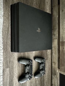 PlayStation 4 w/ 2 controllers