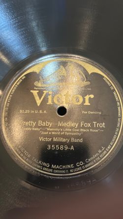 Antique victor long play records with holder