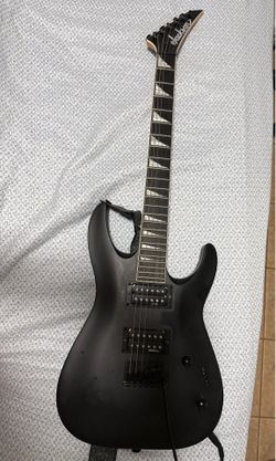 electric guitar with amp