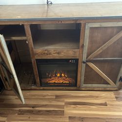 Custom Built Cabinet with built In fireplace,shelves And a trash can storage 58”x21”x 37” H