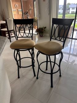 Set of 2 Black Metal Swivel Bar Stools with Beige Cushioned Seats & Backs