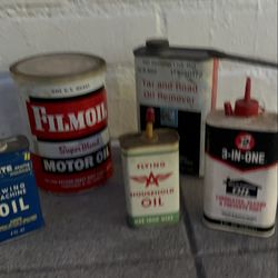 Vintage oilers tins
